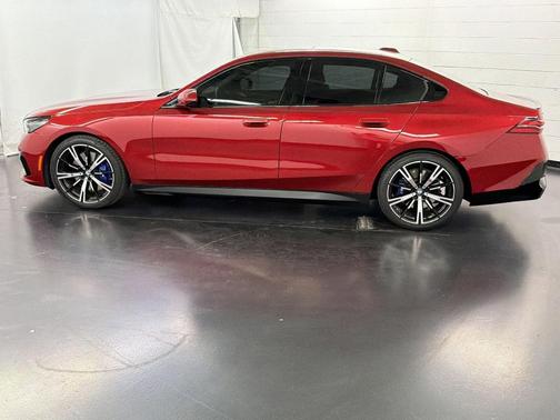 Red Metallic 2025 BMW 540 i xDrive