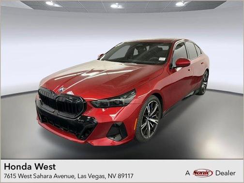 Red Metallic 2025 BMW 540 i xDrive