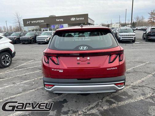 Ultimate Red 2026 Hyundai TUCSON Hybrid Blue SE