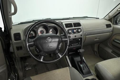 Photo 2 of 79 of 2004 Nissan Xterra SE