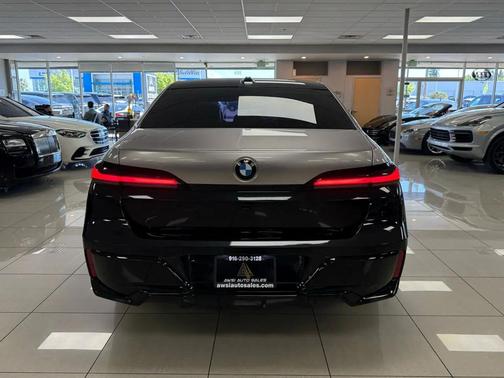 Black 2024 BMW 740 740i