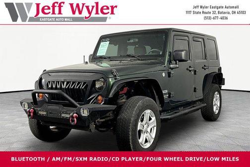 Natural Green Pearl 2010 Jeep Wrangler Unlimited Sport