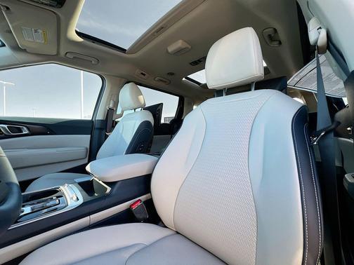 Ivory Silver 2026 Kia Carnival Hybrid SX Prestige