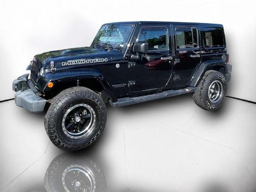 Black Clearcoat 2017 Jeep Wrangler Unlimited Smoky Mountain