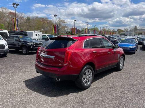 Crystal Red Tintcoat 2015 Cadillac SRX Luxury Collection