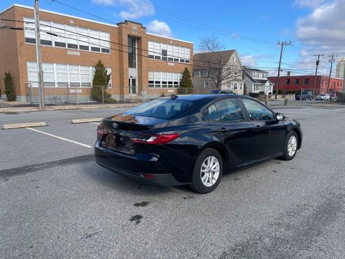 Midnight Black Metallic 2025 Toyota Camry LE