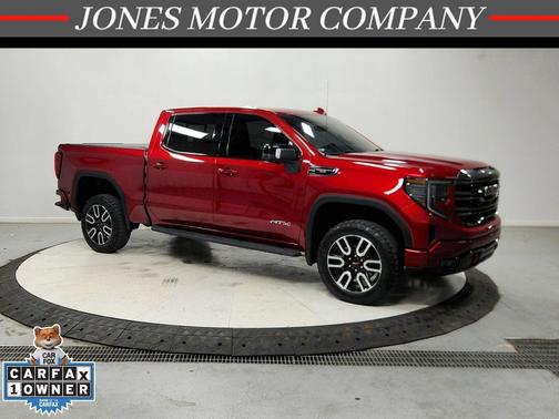 Volcanic Red Tintcoat 2024 GMC Sierra 1500 AT4