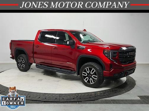 Volcanic Red Tintcoat 2024 GMC Sierra 1500 AT4