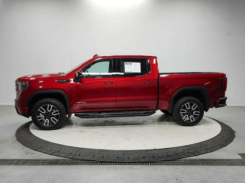 Volcanic Red Tintcoat 2024 GMC Sierra 1500 AT4