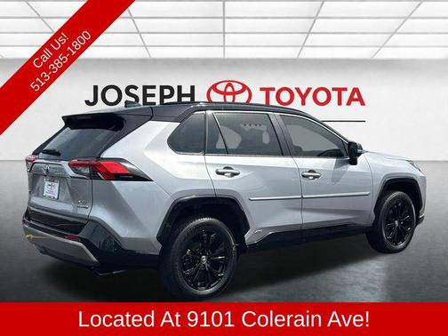 Silver Sky Metallic/Midnight Black Metallic 2023 Toyota RAV4 Hybrid SE