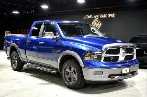 2011 Dodge Ram 1500 Outdoorsman 4x4 4dr Quad Cab 6.3 ft. SB Pickup