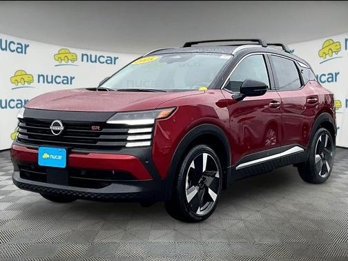 Red 2025 Nissan Kicks SR