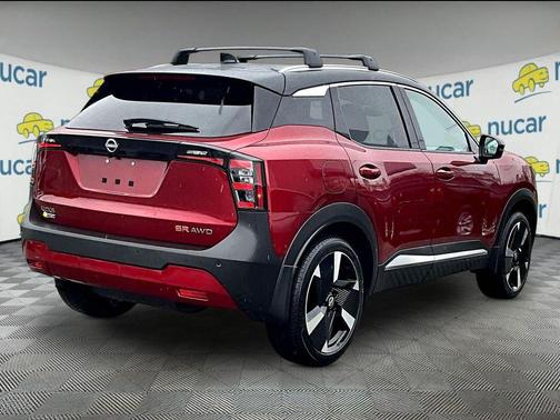 Red 2025 Nissan Kicks SR