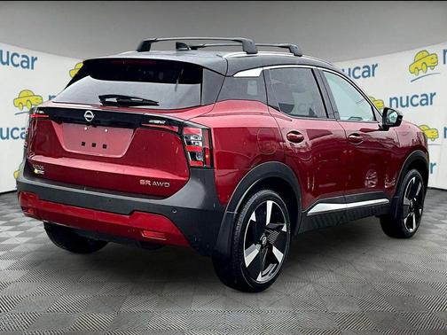 Red 2025 Nissan Kicks SR