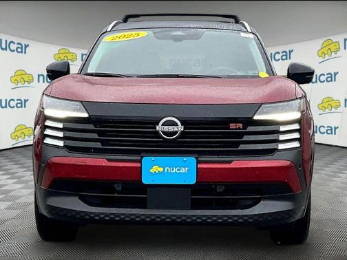 Red 2025 Nissan Kicks SR
