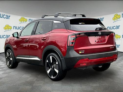 Red 2025 Nissan Kicks SR