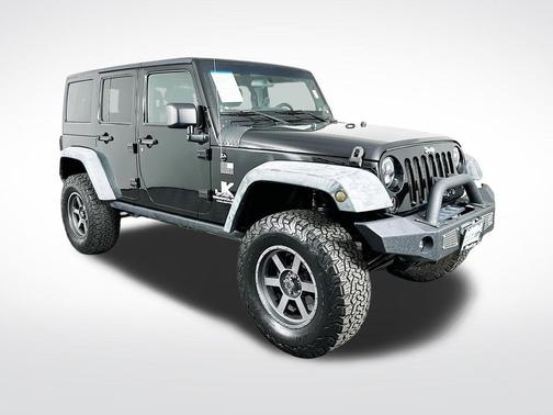 Black 2012 Jeep Wrangler Unlimited Rubicon
