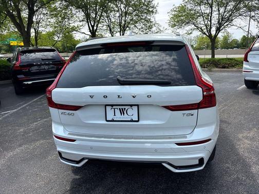 Crystal White Metallic 2025 Volvo XC60 Plug-In Hybrid Plus, T8 AWD Electric/Gasoline, Dark