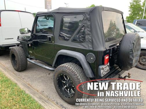 Black Clear Coat 1998 Jeep Wrangler Sport