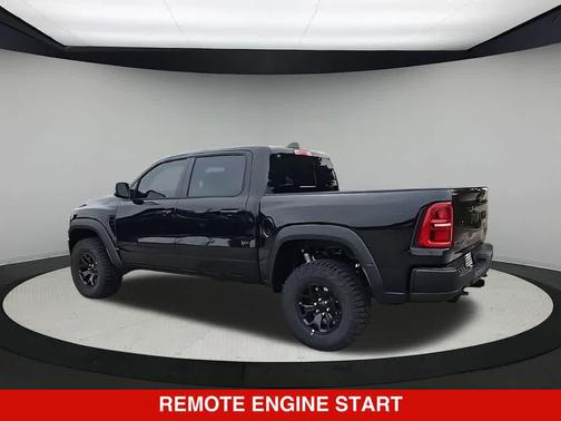 Diamond Black Crystal Pearlcoat 2026 RAM 1500 RHO Crew Cab 4x4 5'7' Box