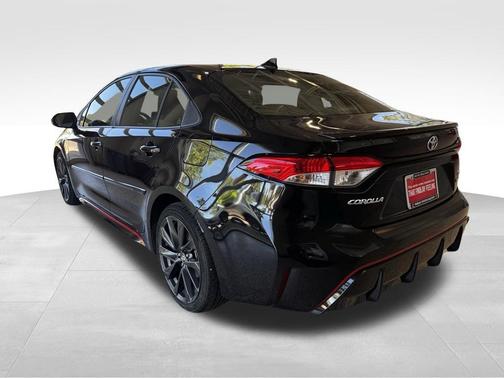 Midnight Black Metallic 2023 Toyota Corolla Hybrid SE Infrared