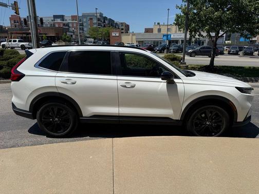 Platinum White Pearl 2025 Honda CR-V Hybrid Sport Touring AWD