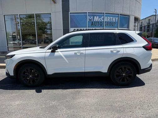 Platinum White Pearl 2025 Honda CR-V Hybrid Sport Touring AWD