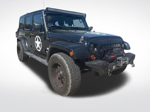 Black Clearcoat 2011 Jeep Wrangler Unlimited Sahara