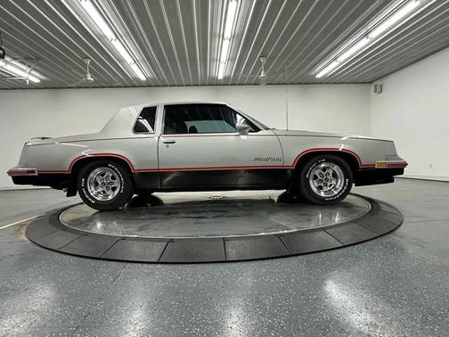 Silver 1984 Oldsmobile Cutlass Calais OLDS 15th Anniversary