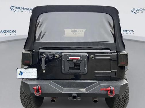 Black Clearcoat 2013 Jeep Wrangler Unlimited Sahara