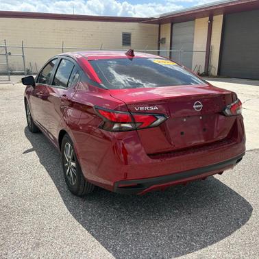 Scarlet Ember Tintcoat 2025 Nissan Versa 1.6 SV