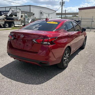 Scarlet Ember Tintcoat 2025 Nissan Versa 1.6 SV