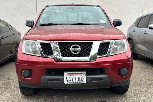 Red 2017 Nissan Frontier SV