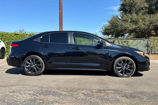 Midnight Black Metallic 2026 Toyota Corolla Hybrid SE
