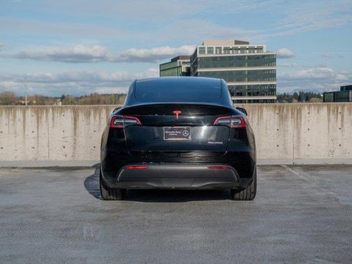 Solid Black 2024 Tesla Model Y Performance Dual Motor All-Wheel Drive