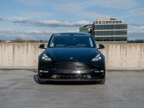 Solid Black 2024 Tesla Model Y Performance Dual Motor All-Wheel Drive