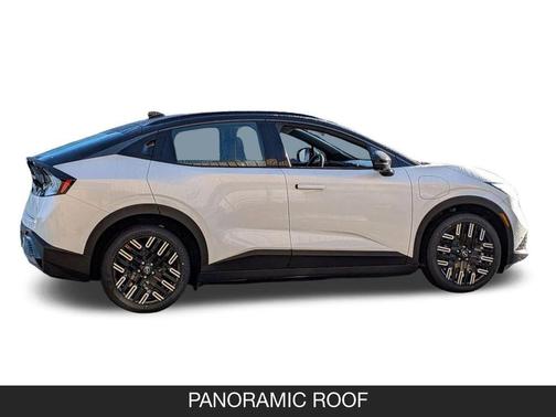 Everest White Pearl Tricoat/Black 2026 Nissan Leaf PLATINUM+