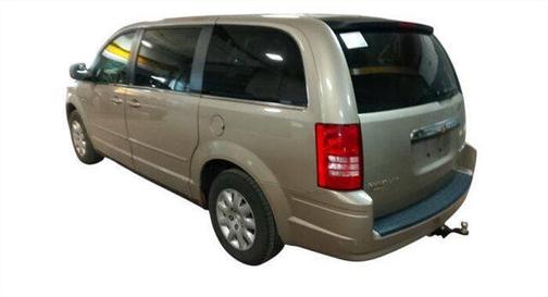 Tan 2009 Chrysler Town & Country LX