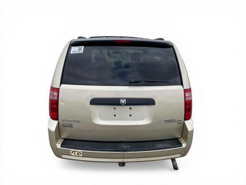 Tan 2010 Dodge Grand Caravan Hero
