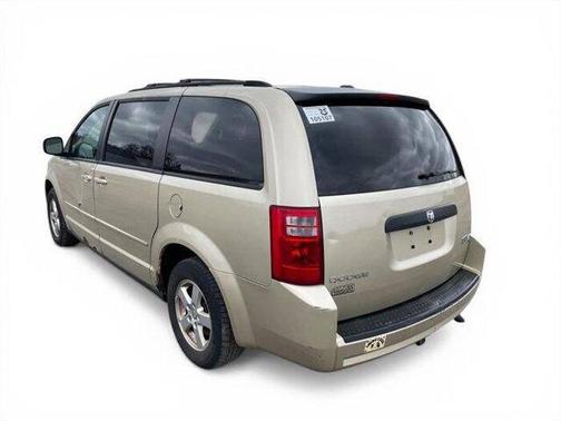 Tan 2010 Dodge Grand Caravan Hero