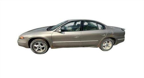 Tan 2001 Pontiac Bonneville SE