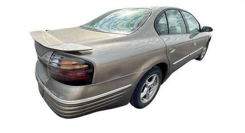 Tan 2001 Pontiac Bonneville SE