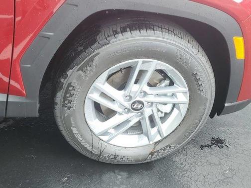 Red 2026 Hyundai TUCSON SE