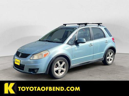 Vapor Blue Metallic 2009 Suzuki SX4 Auto Touring Pkg AWD