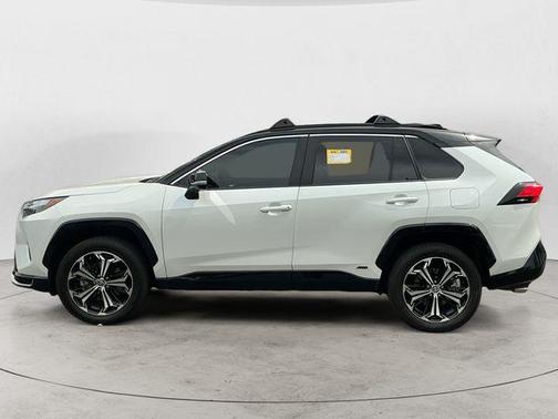 Wind Chill Pearl/Midnight Black Metallic 2025 Toyota RAV4 Hybrid SE