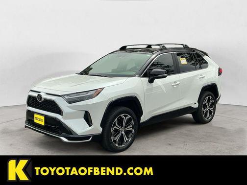 Wind Chill Pearl/Midnight Black Metallic 2025 Toyota RAV4 Hybrid SE