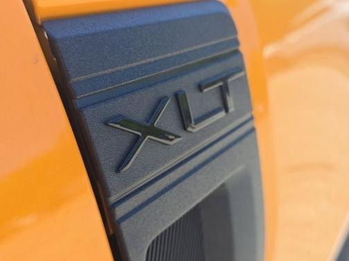 Orange 2026 Ford Maverick XLT