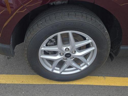 Burgundy 2023 Ford Edge SEL