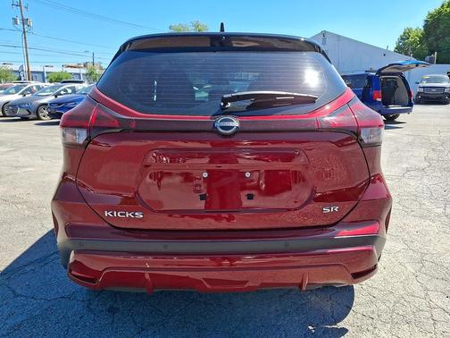 Scarlet Ember Tintcoat/Super Black 2023 Nissan Kicks SR