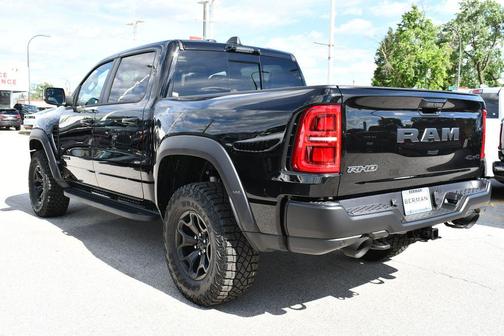 Diamond Black Crystal Pearlcoat 2026 RAM 1500 RHO Crew Cab 4x4 5'7' Box